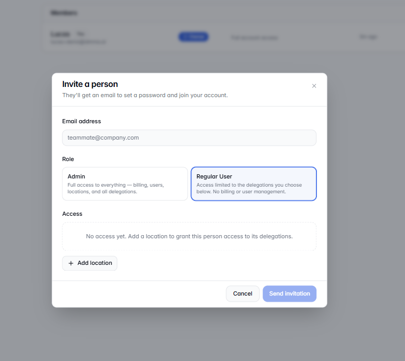 Invite a person modal showing Admin vs Regular User options